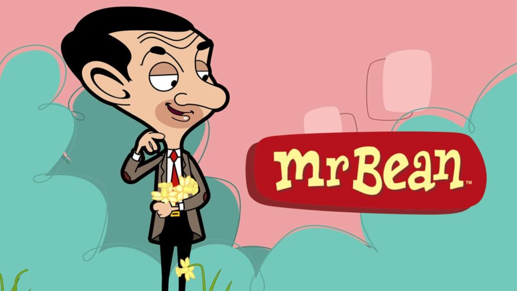 mr bean standing in a garden holding flowers
